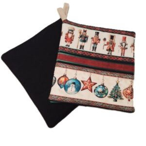 Christmas Nutcracker with Ornaments on Cream Background